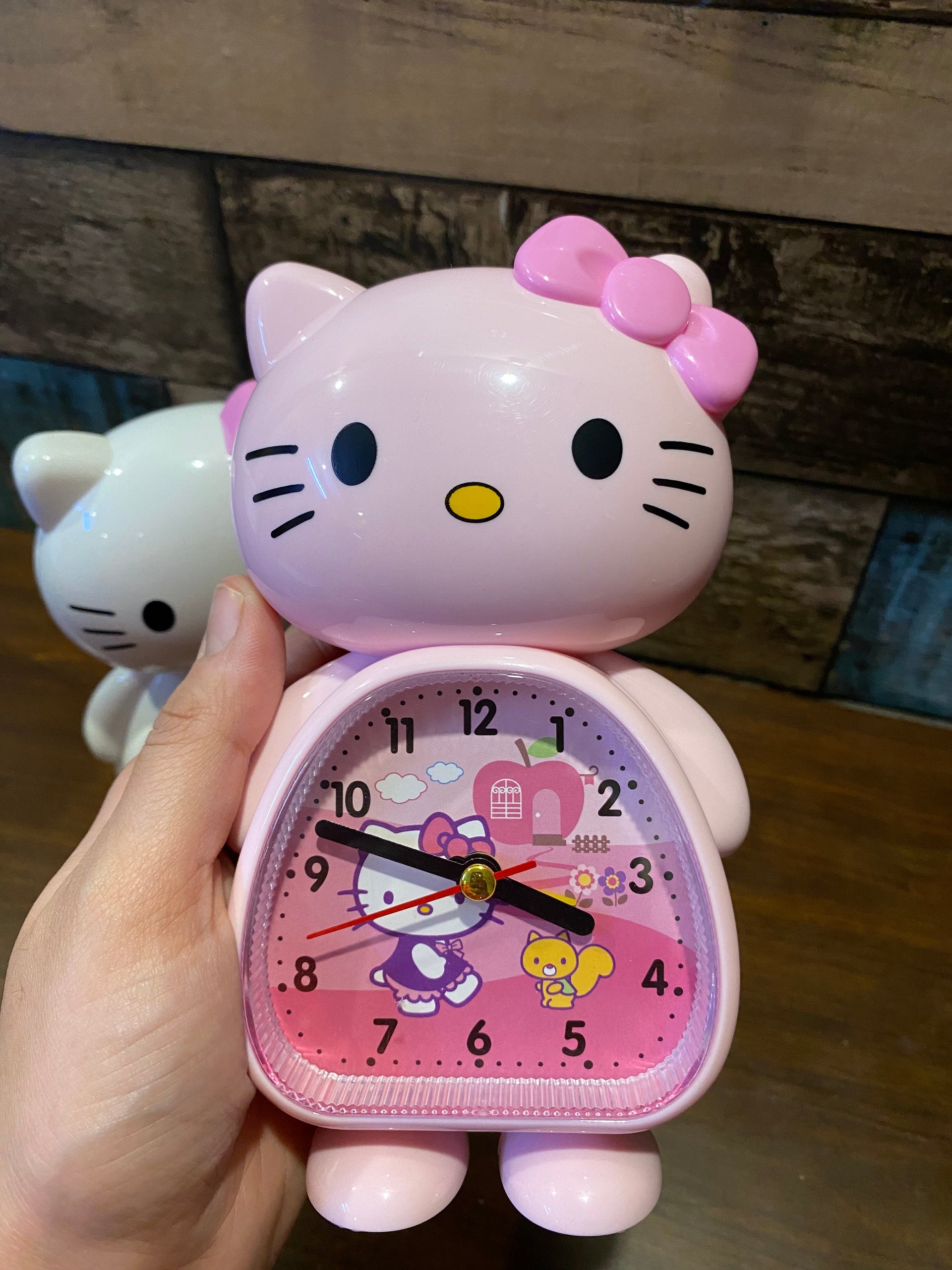 hello kitty dino clock